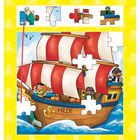 Text: "HILDE". Illustration eines Segelschiffs mit roten und weißen Segeln, umgeben von Puzzleteilen auf gelbem Hintergrund mit Kraken.