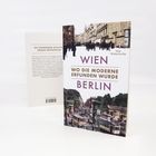 Buchtitel: „WIEN WO DIE MODERNE ERFUNDEN WURDE BERLIN“. Vorderseite zeigt eine historische Straßenszene mit Straßenbahnen.