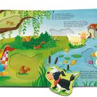 Ein kindliches Buch zeigt Ida beim Picknick am Teich mit Tieren, wie Enten, einem Hund und Eichhörnchen.