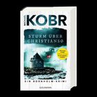 "STURM ÜBER CHRISTIANSØ", ein Krimi von Michael Kobr. Küste mit Turm und dänischer Flagge, stürmisches Meer.