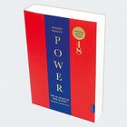Buchtitel: "POWER - Die 48 Gesetze der Macht" von Robert Greene. Roter Umschlag mit blauem Streifen und gelbem Kreis.