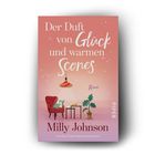 "Der Duft von Glück und warmen Scones", Roman von Milly Johnson. Illustration: roter Sessel, Tisch, Pflanze.