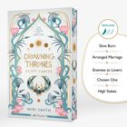 Ein Buchcover mit dem Titel "Drowning Thrones: Egypt Empire" von Miri Smith. Dekorative florale Muster.