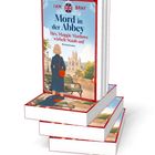 "Mord in der Abbey" von Ian Bray, Kriminalroman. Illustration: Frau vor Abtei auf Parkbank sitzend. Stapel Bücher.