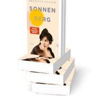 Auf dem Buchcover steht: "BRIGITTE GLASER, SONNENBERG, SPIEGEL Bestseller-Autorin". Es zeigt eine Frau mit nachdenklichem Ausdruck.