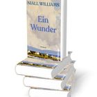 „NIALL WILLIAMS: Ein Wunder, ROMAN“. Ein Buchstapel; Cover zeigt eine Landschaft mit Häusern.