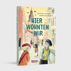 „HIER WOHNTEN WIR“ von Martine Letterie und Saskia Halfmouw. Illustration mit Kindern in einer Stadt.