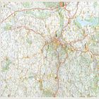 Straßennamen und Ortsnamen in Gelb und Schwarz. Viele rote und gelbe Straßenlinien. Links eine Legende mit Symbolen.