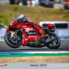 Kalenderblatt Januar 2027 mit einem Rennfahrer auf einer roten Ducati im Vordergrund, umgeben von Sponsorenlogos.