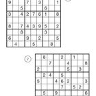 Zwei nummerierte Sudoku-Rätsel, nummeriert mit 1 und 2. Unten sind drei Glühbirnensymbole, eines ist gefüllt.