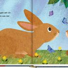 Text: "... durch deine Augen seh ich die Welt so schön wie nie!" Zwei braune Hasen, umgeben von Schmetterlingen und Blättern.