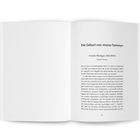 Seite eines Buches mit Titel: "Die Geburt von »Immo Tommy«", gefolgt von einem Zitat: "Und das Wichtigste: MACHEN!" von Tomislav Primorac.