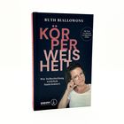 „Ruth Biallowons: Körperweisheit – Wie Selbstheilung wirklich funktioniert.“ Eine Frau mit Brille, nachdenklich.