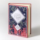 "Charles Dickens: A Christmas Carol. The English Edition." Buchcover mit floralen Motiven und geometrischem Design.