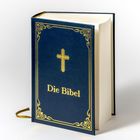 „Die Bibel“ in goldener Schrift auf blauem Buch mit goldenem Kreuz-Design.