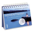 ADVENTfasten: Von St. Martin bis Weihnachten. Kleiner Kalender mit winterlichem Seebild und leuchtender Laterne auf Stein.