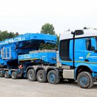 Der Text "FELBERMAYR", "www.felbermayr.cc" erscheint mehrfach. Ein großer blauer Schwertransporter auf einem Feldweg.