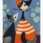 "Januar" und Kalenderzahlen unten. Zwei stilisierte Katzen, eine mit orange-weißen Streifen, auf blauem Hintergrund.