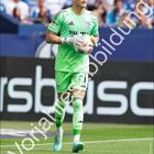 Loris Karius, Vorjahresabbildung. Fußballtorwart in grüner Uniform, Kalender für Januar mit Schalke 04 Logo.