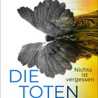 "GRETA JUNG, DIE TOTE KLÄGERIN, Nichts ist vergessen, Lübbe, Kriminalroman." Zeigt graue Flügel vor gelbem Farbhintergrund.