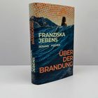 "FRANZISKA JEBENS", "Roman Fischer", "ÜBER DER BRANDUNG". Cover: Frau im Wasser vor Bergkulisse.