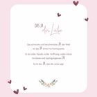 Das Bild zeigt einen romantischen Text über das Hochzeits-JA, umgeben von Herzen und einem floralen Design auf rosa Hintergrund.