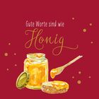 "Gute Worte sind wie Honig." Illustration: Honigglas, Löffel, Honigbrot, goldene Sprenkel auf rotem Hintergrund.