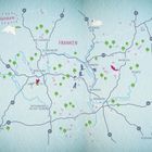 „Glückskarte“, „Franken“. Eine stilisierte Karte mit Wegen, Bäumen und Tieren, zeigt Orte und Autobahnnummern.
