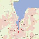 Karte von Flensburg und Umgebung, mit markierten Punkten und Ortsnamen wie Deutschland, Dänemark, und Hafen.