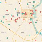 KÖLN. Eine stilisierte Karte mit nummerierten Punkten in verschiedenen Farben zeigt Viertel wie Ehrenfeld, Lindenthal, Süß und Deutz.