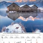 Kalenderblatt für Januar 2027 zeigt Hütten auf einem zugefrorenen See mit verschneiten Bergen im Hintergrund.