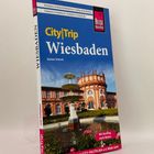 „Kauderwelsch Katalanisch Wort für Wort“. Ein Buchcover mit Menschen, die eine menschliche Pyramide bilden.