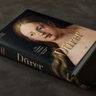"Dürer", "The Complete Paintings", "TASCHEN" auf einem Buchcover mit einer Porträtillustration.