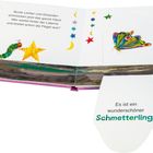 Text: "Bunte Lichter und Girlanden...breitet schon die Flügel aus?" und "Es ist ein wunderschöner Schmetterling!" 
Illustration: Eine Raupe, ein Stern und ein bunter Schmetterling.