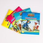 "Super Bikes: Einsatz für Flash", "Carla und Charlie", "Masha und Drako", "Das Training". Vier bunte Kinderbücher decken sich.