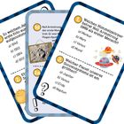 Karten mit Quizfragen über Planeten und das Jahr der ersten Mondlandung. Bunte Planetengrafiken und eine Sonnenillustration.