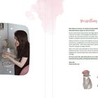 Vorstellung: Eine Frau sitzt an einem Tisch mit einer Katze, Zeichensachen; Illustration einer Katze mit Pfotenabdrücken unten.