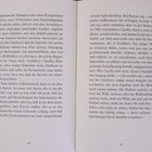 Seitenzahlen 68 und 69. Geschriebener Text in zwei Spalten auf gegenüberliegenden Seiten eines aufgeschlagenen Buches.