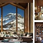 Großes Fenster mit Blick auf schneebedeckten Berg, gemütlicher Wohnbereich mit Sofas und Kamin, elegante Bibliothek.