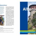 Text: "Unterwegs mit Ralph-Raymond Braun", "Albanien", "Ralph-Raymond Braun", "3. komplett überarbeitete und aktualisierte Auflage 2026". Links eine Person, rechts ein historischer Turm.