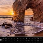 Text: "Bretagne 01", "Sonnenuntergang am Felsbogen von Port Blanc, Halbinsel Quiberon." Sonnenuntergang über felsiger Küste.