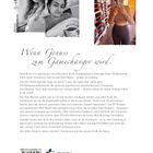 Runde Kokos-Pralinen auf einem hölzernen Tablett, einige aufgebrochen, zeigen eine Mandel in der Mitte.