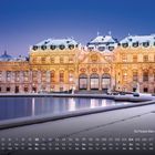 Kalenderseite zeigt: „Schloss Belvedere Wien 1“. Barockgebäude, verschneit, reflektiert im Teich, winterlicher Himmel.