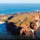 Text: "Helgoland" oben rechts, "1" darunter. Kalender von Fr, Sa, So, Mo... bis 31. Luftaufnahme einer Insel mit roten Klippen.