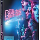 "The Bearded Mermaid" in leuchtendem Pink. Köpfe in dramatischem Licht, darunter Figuren in glitzernden Outfits.