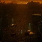 Keine erkennbaren Texte. Eine düstere, verlassene Straßenszene mit Ruinen, Autos und Straßenlampen bei orangem Himmel.