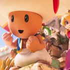 Ein fröhlicher Charakter mit großem Pilzhut, in der Nähe eine blonde Prinzessin in rosa Kleid, beide scheinen gespannt.