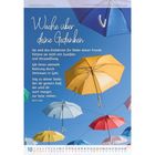 Wache über deine Gedanken – Zitat von Ruth Heil. Bunte Regenschirme schweben vor einem blauen Himmel.