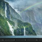 Kalenderseite mit Datum 10 unten, darüber Wasserfälle an grünen Berghängen und ein Regenbogen im Hintergrund.