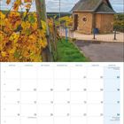 Kalenderblatt Oktober 2027. Links Weinreben, rechts eine Kapelle. Oben weht eine rot-weiß-blaue Flagge.